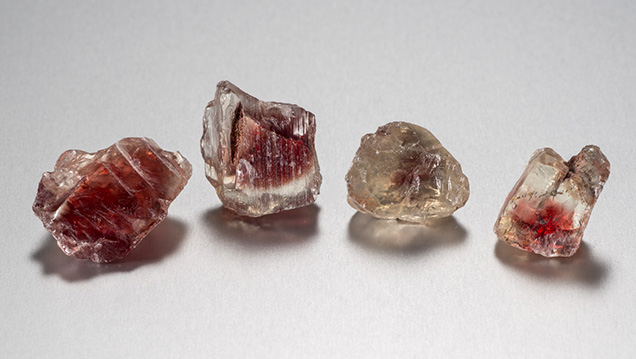 This group of red sunstones reflects recent production from the mine’s pit. - Robert Weldon This group of red sunstones reflects recent production from the mine’s pit. - Robert Weldon