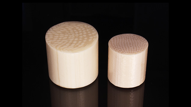 Two resin imitation ivory materials show parallel linear striations. Two resin imitation ivory materials show parallel linear striations.