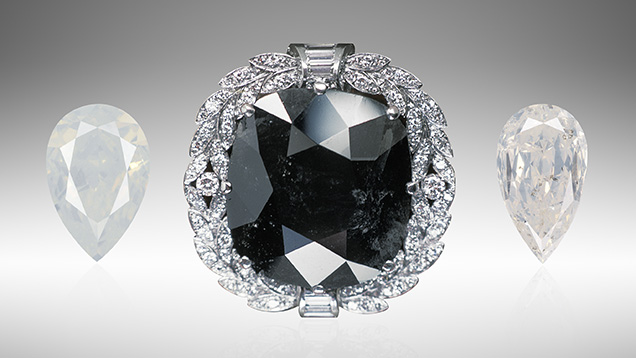 The Black Orlov and two Fancy white diamonds The Black Orlov and two Fancy white diamonds