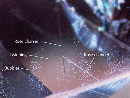 Bubbles, Rose channels, and twinning planes seen in synthetic sapphire. Bubbles, Rose channels, and twinning planes seen in synthetic sapphire.