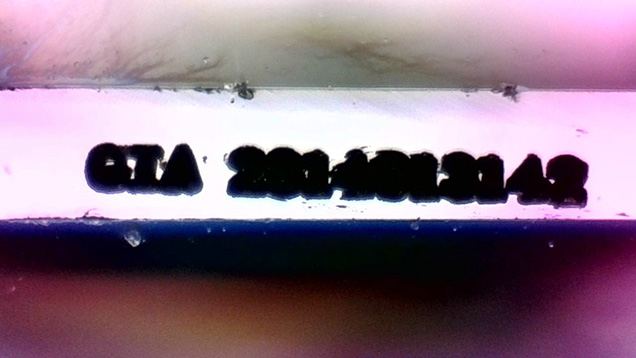 Fraudulent inscription identified on a synthetic moissanite.