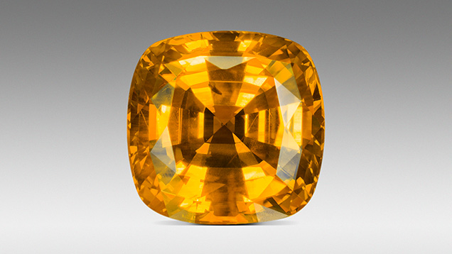 Figure 24. This unusual gem from the Bang Kha Cha deposit is colored by a high concentration of both the Fe3+ and the h•-Fe3+ chromophores. The color is referred to as “Mekong Whisky.” Photo by Ronnakorn Manorotkul/Lotus Gemology.