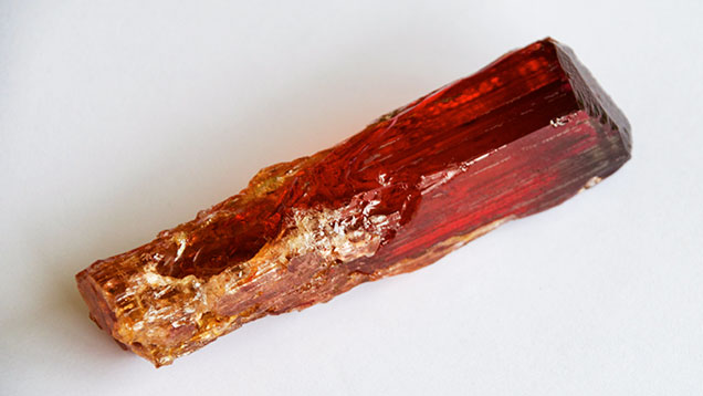 The Imperial topaz crystal before carving
