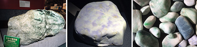 Japanese jadeite boulders and pebbles. Figure 6. Left: A 4.6 ton jadeite rough boulder is displayed at the Fossa Magna Museum in Itoigawa. This eroded and rounded boulder from the Kotaki area is mostly white, with some green areas of jadeite; the fibrous structure in the black area is amphibole. Thin fault-like veins are filled with white minerals. Center: A 30 kg rounded boulder of predominantly lavender jadeite was found along the Hime River in Itoigawa. The lavender color is dispersed irregularly over the white matrix. Right: These rounded jadeite pebbles, found along the coast in Itoigawa-Omi, are approximately 2 to 15 cm long. Photos by Ahmadjan Abduriyim, courtesy of the Fossa Magna Museum and the Jade Ore Museum (Hisui Gensekikan).