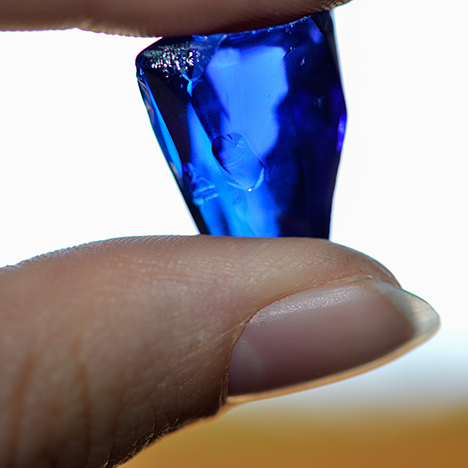 Gem tanzanite with remarkable color and clarity.. Figure 2. The gem was cut from a 13 g rough tanzanite of remarkable color and clarity. Photo courtesy of Sonja Kreis Unique Jewelry.