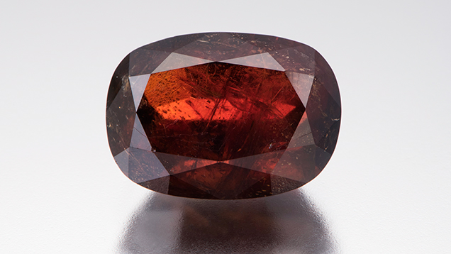 Orangy red cordierite. Orangy red cordierite.