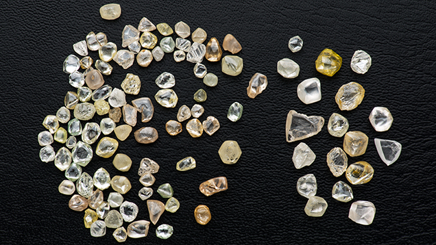 Alluvial diamonds from Minas Gerais, Brazil. Figure 2. This selection of diamonds recovered from the Abaeté River in Minas Gerais, weighing a total of 77.82 carats, is typical of the material being found today in Brazil’s alluvial deposits. Photo by Robert Weldon/GIA, courtesy of Giovani de Deus Borges.