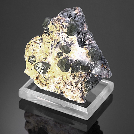 Namibian demantoid from the Green Dragon mine, preserved in host rock Namibian demantoid from the Green Dragon mine, preserved in host rock