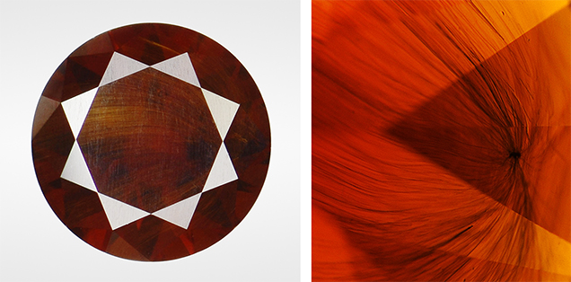 Orangy brown andradite with horsetail inclusions. Orangy brown andradite with horsetail inclusions.