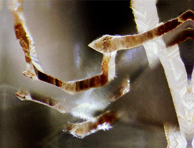Etch channel with pyramidal termination. Etch channel with pyramidal termination.