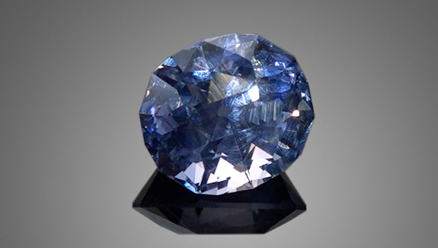 Unheated sapphire removed from a vintage 1960s platinum pendant. Unheated sapphire removed from a vintage 1960s platinum pendant.