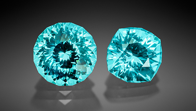 Two cut and polished synthetic sapphires. Two cut and polished synthetic sapphires.