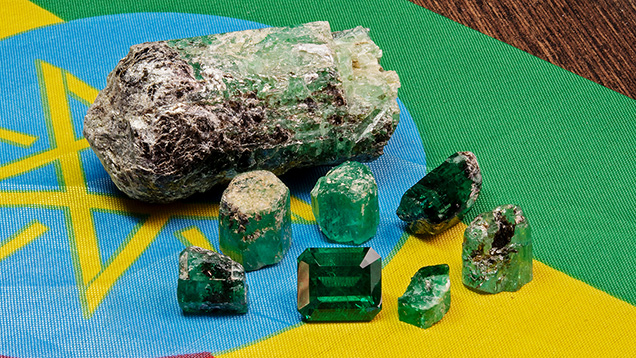 Rough and faceted Ethiopian emeralds