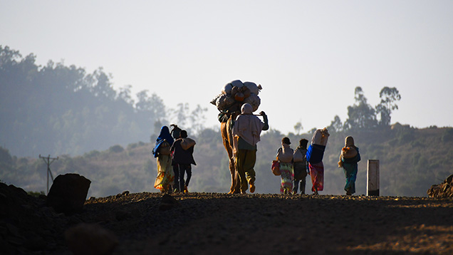 Ethiopian family on the road to the market in Chila