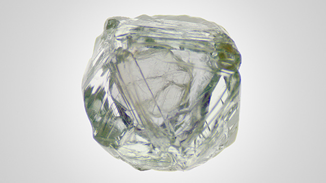 Small hexagonal diamond crystal enclosed in the cavity. Small hexagonal diamond crystal enclosed in the cavity.