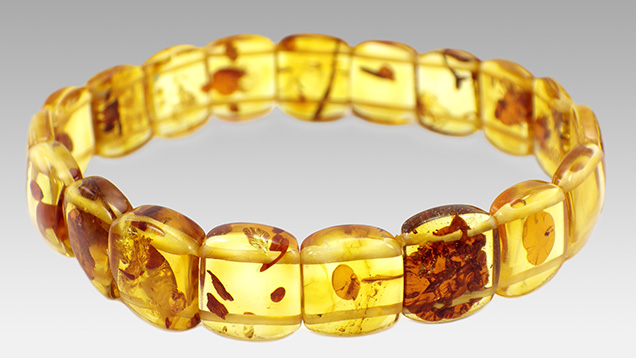 Bracelet featuring color-enhanced amber. Bracelet featuring color-enhanced amber.