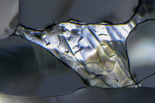 Reflected light reveals the smooth texture of the radiation stains. Reflected light reveals the smooth texture of the radiation stains.