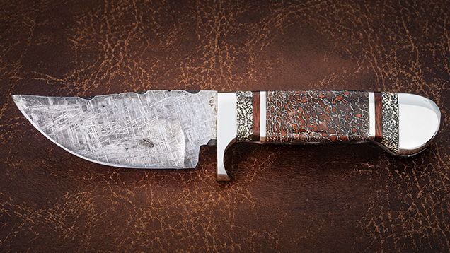 Knife with meteorite blade and gem dinosaur bone handle. Knife with meteorite blade and gem dinosaur bone handle.