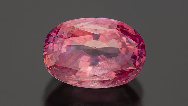 Figure 3. A 7.08 ct padparadscha sapphire. Photo by Robert Weldon; courtesy of Kreis Jewellery GmbH. Figure 3. A 7.08 ct padparadscha sapphire. Photo by Robert Weldon; courtesy of Kreis Jewellery GmbH.