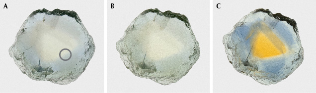 Figure 54. The Dry Cottonwood Creek sapphire in example 5, measuring 7.2 × 6.7 mm: unheated (A), heated to 1200°C in pure O2 (B), and heated to 1700°C in pure O2 (C). The gray circle shows area of analysis. Photos by Aaron Palke.
