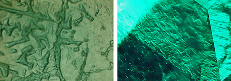 Figure 24. Patterns seen in faceted Colombian gota de aceite emeralds display numerous irregular hillocks, columns, or walls. The left image is viewed in immersion, parallel to the c-axis. Photomicrographs by K. Schmetzer (left) and M.P.H. Curti, Bellerophon Gemlab (right); fields of view 1.9 mm (left) and 1.6 mm (right).