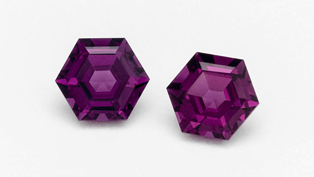 Figure 10. A pair of 5 mm hexagonal step-cut grape garnets from the State of Odisha on the Bay of Bengal in eastern India. Courtesy of Eric Braunwart, Columbia Gem House. Figure 10. A pair of 5 mm hexagonal step-cut grape garnets from the State of Odisha on the Bay of Bengal in eastern India. Courtesy of Eric Braunwart, Columbia Gem House.