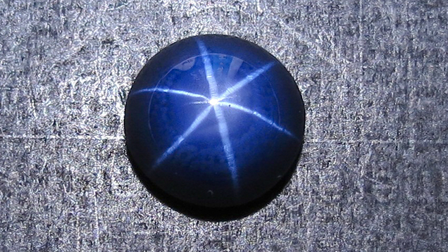 SU15-GNI-fig28_185326-636x358.jpg. This specimen was revealed to be a synthetic star sapphire.