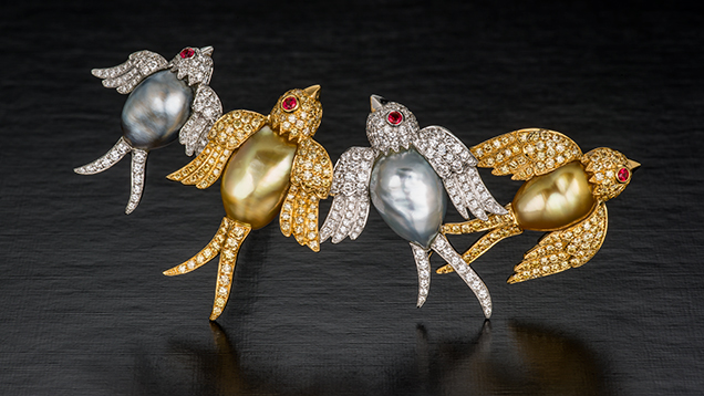 Brooch depicting swallows featuring “keshi” cultured pearls, along with diamonds and rubies. Brooch depicting swallows featuring “keshi” cultured pearls, along with diamonds and rubies.