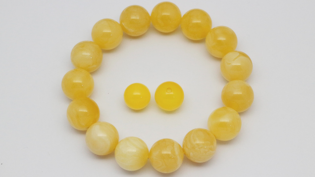 Steam-dyed amber beads and bracelet.