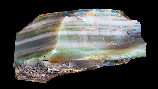 Color bars and potch in opal Color bars and potch in opal