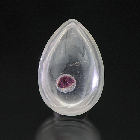 SU16-MW-Figure-9_203668-468x468.jpg. Quartz cabochon with garnet “inclusion”