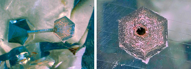 Two hexagonal dissolution cavities connected by a hexagonal etch channel. Two hexagonal dissolution cavities connected by a hexagonal etch channel.
