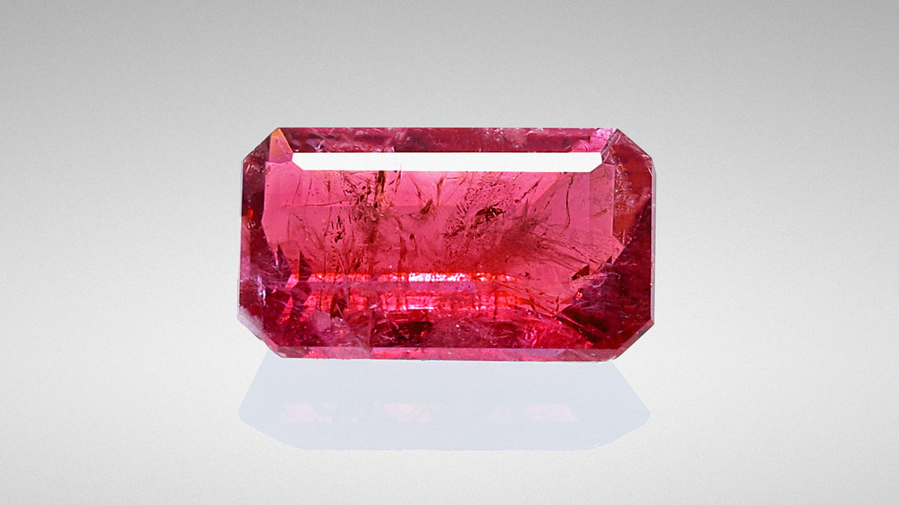 This emerald-cut red beryl weighs 0.22 carats. This emerald-cut red beryl weighs 0.22 carats.