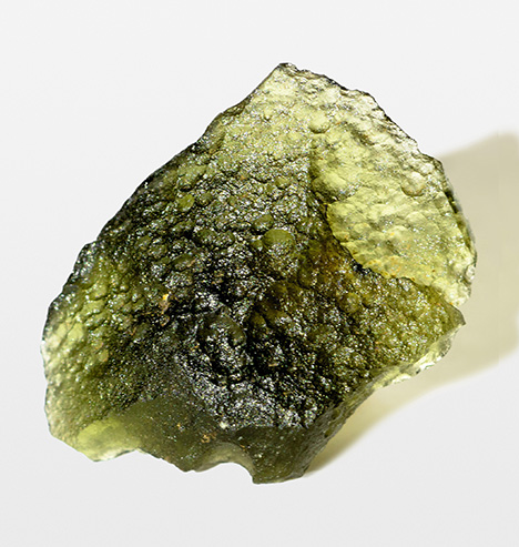 This specimen shows the typical texture of rough ekanite. This specimen shows the typical texture of rough ekanite.