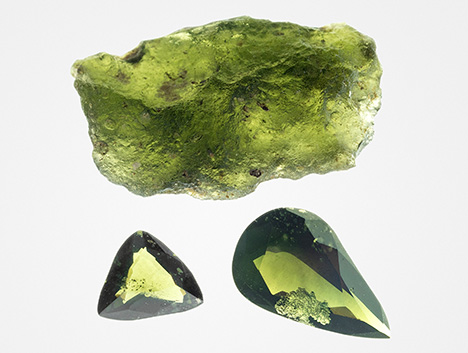 Ekanite rough and cut stones appear yellowish green in transmitted light. Ekanite rough and cut stones appear yellowish green in transmitted light.