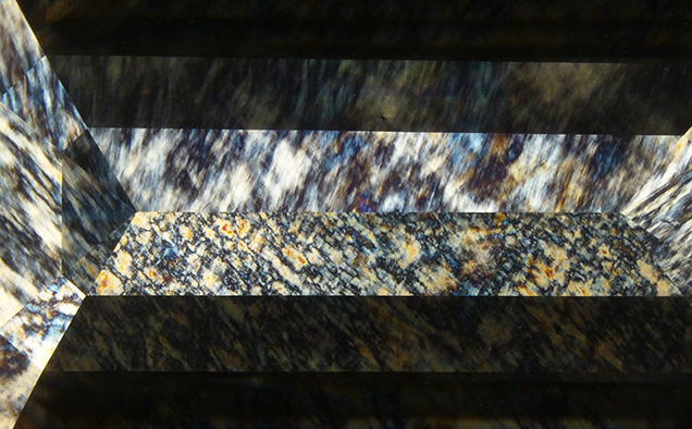 Figure 2. A high amount of strain and a strong birefringence pattern were observed using crossed polarizers. Photomicrograph by Ka Wing Tam; field of view 15.92 mm. Figure 2. A high amount of strain and a strong birefringence pattern were observed using crossed polarizers. Photomicrograph by Ka Wing Tam; field of view 15.92 mm.