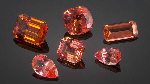 Nigerian väyrynenite vary from orange to orangy pink colors and occur in high clarity. These stones range from 0.72 to 2.45 ct. Photo by Nuttapol Kitdee; courtesy of Thai Lanka Trading. Nigerian väyrynenite vary from orange to orangy pink colors and occur in high clarity. These stones range from 0.72 to 2.45 ct. Photo by Nuttapol Kitdee; courtesy of Thai Lanka Trading.