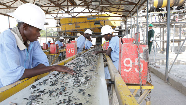 Workers at Gemfields washing plant. Workers at Gemfields washing plant.