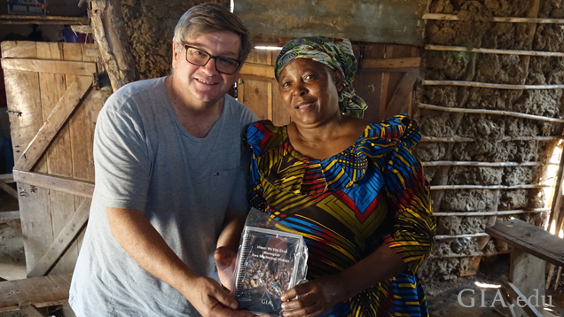 Robert Weldon, GIA director of the Richard T. Liddicoat Library and Information Center, pictured with an artisanal miner from Tunduru, Tanzania.