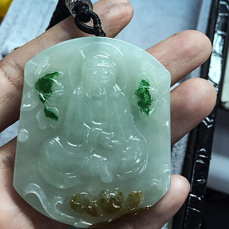 Decorated jadeite pendant. Decorated jadeite pendant.