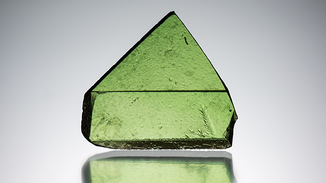 This Russian titanite is green due to vanadium. This Russian titanite is green due to vanadium.