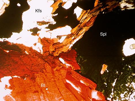 Spinel, biotite, and K-feldspar in corundum sample Spinel, biotite, and K-feldspar in corundum sample