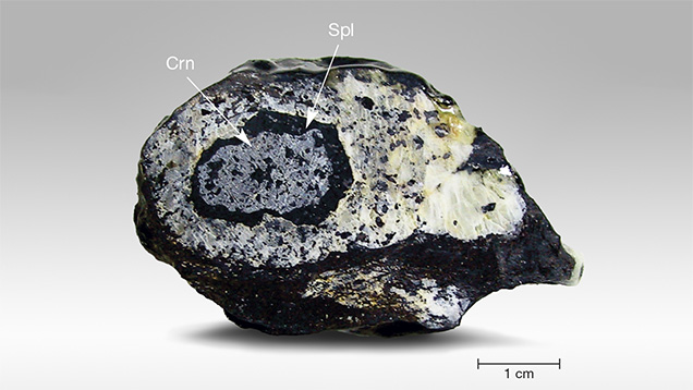 Gray Corundum Coated by Black Spinel Layer Gray Corundum Coated by Black Spinel Layer