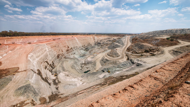 Emerald mining in Zambia features massive open pits