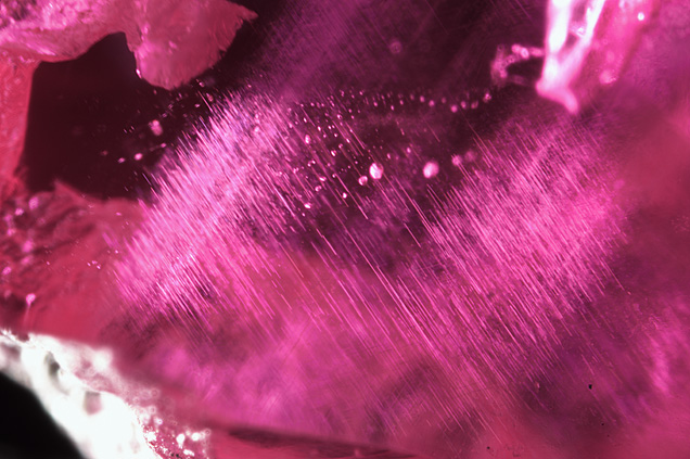 Silk and rounded crystal inclusions Silk and rounded crystal inclusions