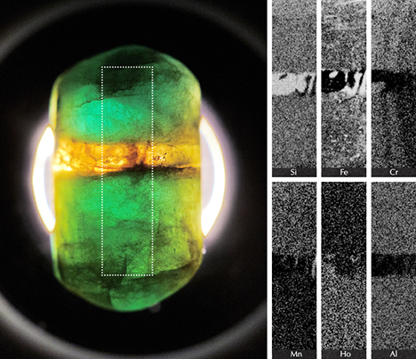 Pill-shaped emerald contains a band of citrine. Pill-shaped emerald contains a band of citrine.