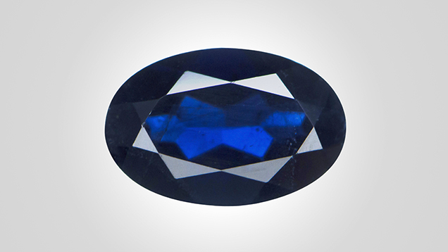 Blue flux-grown synthetic sapphire. Blue flux-grown synthetic sapphire.