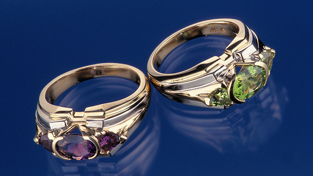 “Healing Sisters” rings featuring amethyst and peridot. “Healing Sisters” rings featuring amethyst and peridot.