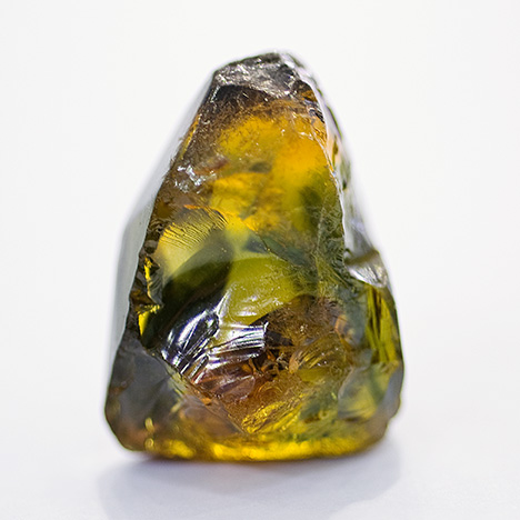 Figure 15. A rough multicolored sapphire crystal weighing more than 30 ct from the Changle region of China. Photo by Robert Weldon.