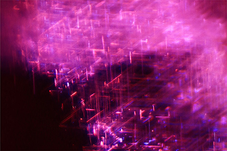 Figure 2. Dense, nested concentrations of silk in the ruby suggest an origin of Mogok, Myanmar. Photomicrograph by Huixin Zhao; field of view 1.13 mm. Figure 2. Dense, nested concentrations of silk in the ruby suggest an origin of Mogok, Myanmar. Photomicrograph by Huixin Zhao; field of view 1.13 mm.